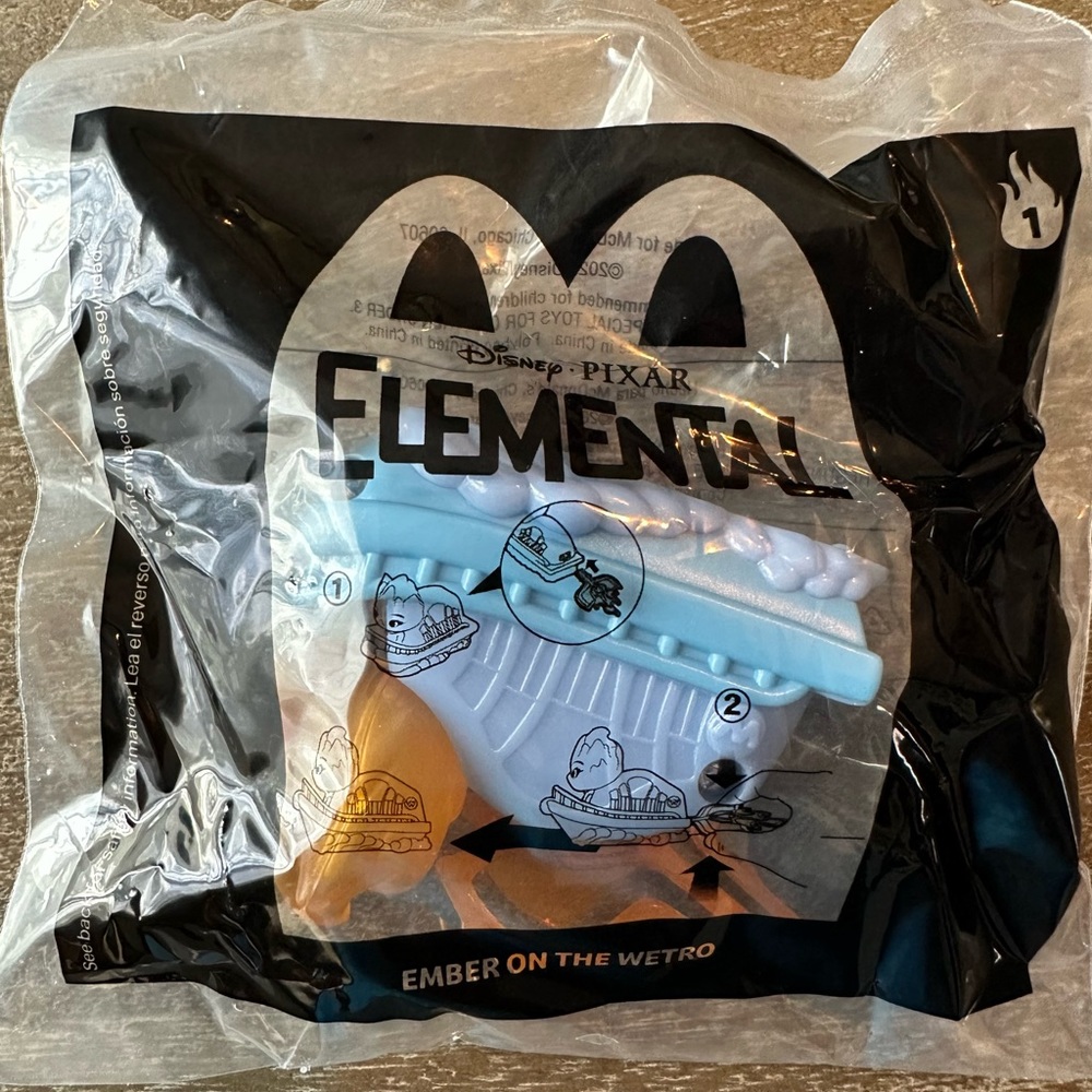 McDonald’s Happy Meal toy: Disney Pixar’s ELEMENTAL “Ember on the Wetro” #1
